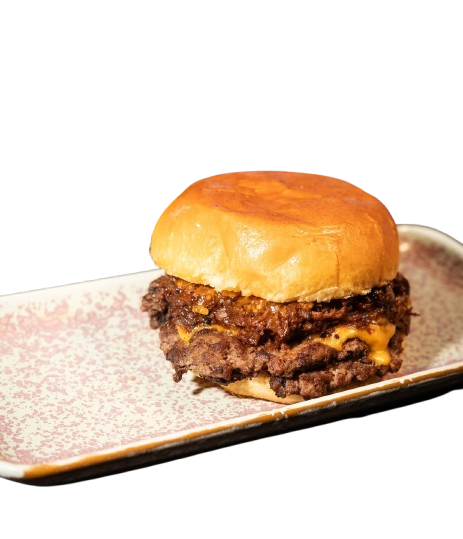"Milagros Birria Burger with braised beef and birria sauce